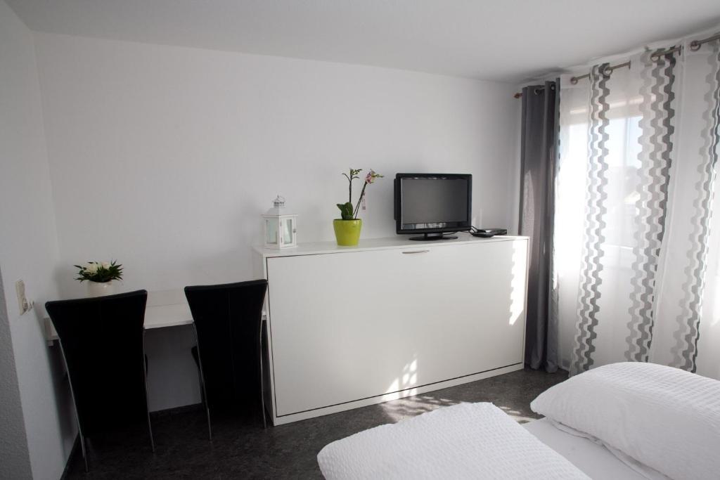 Aparthotel Gastehaus Zur Offenen Tur à Rheinhausen Chambre photo